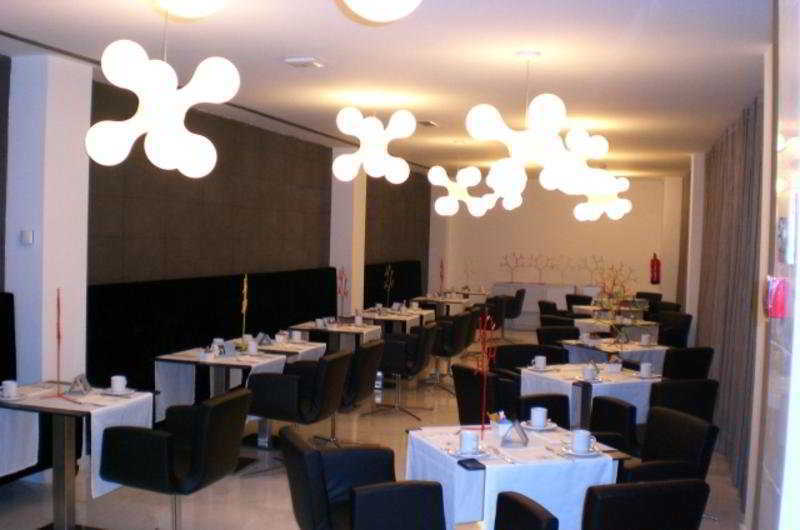 Ikonik Lex Hotell L'Hospitalet de Llobregat Restaurang bild